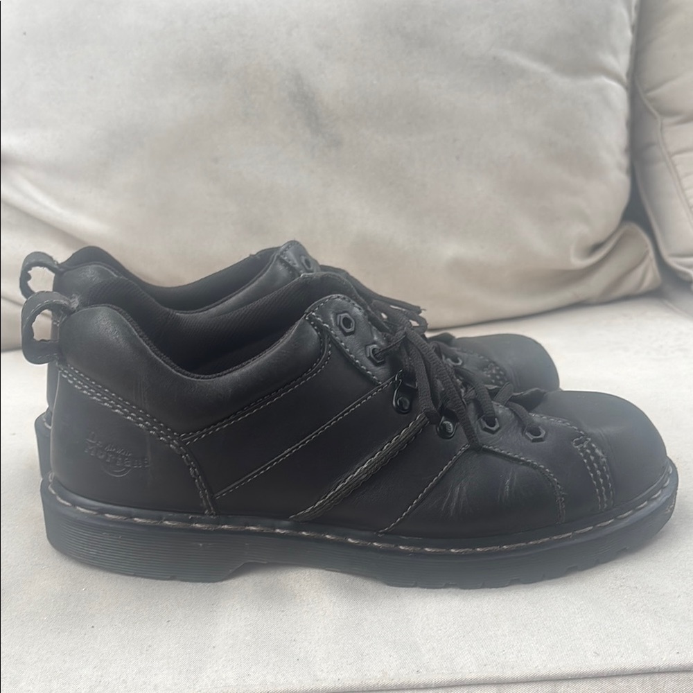 Dr. Martens Black Leather Finnegan boots with Durable Sole